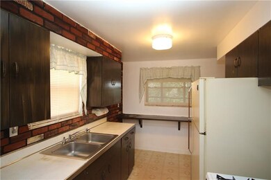 Galley-Style 12x8 Kitchen w/ Gas Stove & Refrigera