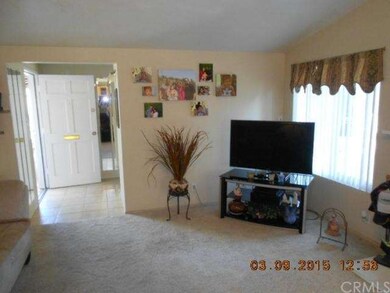 The living room has a fireplace (not shown, to the