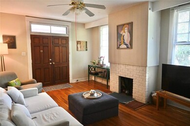 original hard wood floors and fireplace