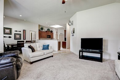Living Room Open To Dining & Kitchen Areas*Neutral Colors.