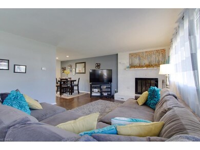 Living room with modern-classic rich hardwood floo