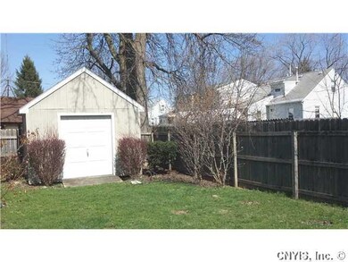 Exterior Back. Fenced-in back yard provides privac