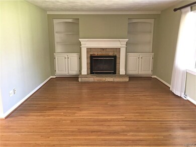 Refinished hardwood floors, wood burning fireplace