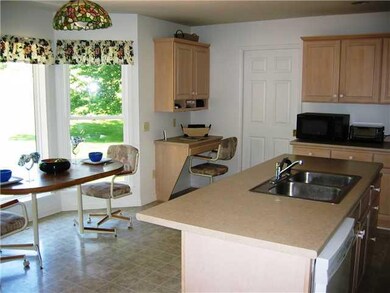 Kitchen. The breakfast nook overlooks the back yar