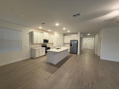 31740 Griffin Sands Ln, Wesley Chapel South, FL 33545 - photo 6