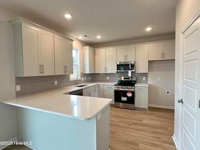 1016 Setting Sun Blvd NE, Winnabow, NC 28479 - photo 3