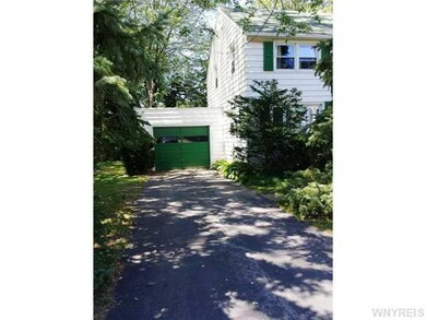 Exterior Front. Left side driveway , garages have 