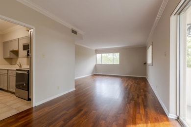 Interior space featuring dark hardwood / wood-styl
