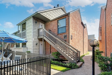 Entrance to #191. This quiet ground-floor unit offers quick access to the nearby pool, blending relaxed living with resort-style convenience.