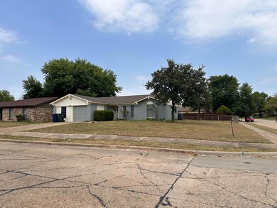 View of front facade featuring a garage and a fron
