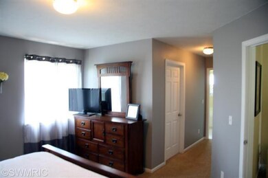 8299 Hawkshead SE unit 63, Byron Center, MI 49315 - photo 7