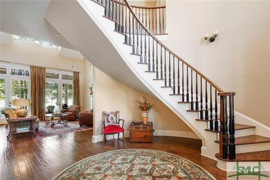 The grand entrance to this home gets its graceful 