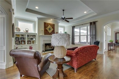 Living room with built-ins and fireplace