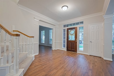 The entryway showcases the new vinyl plank floorin