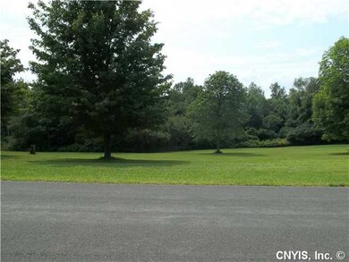 Exterior Front 1 acre well maintained and mowed