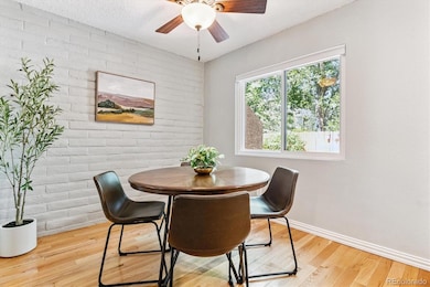 Ceiling fan and large window brings in wonderful natural light