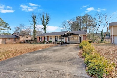Ranch-style home featuring covered porch