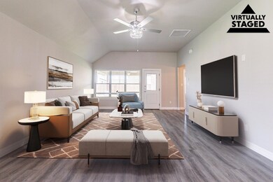 Open living area virtually staged - view to door t