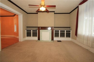 This picture of the living room shows the large wi