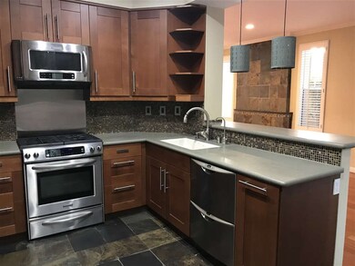 Custom counter top, tile back splash & stainless s