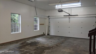 Garage doors facing driveway