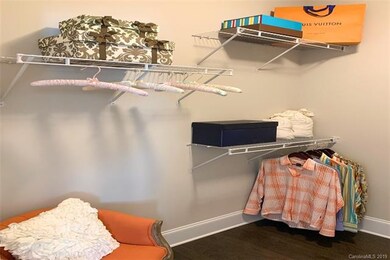 MASTER CLOSET:Pictures of model home may not be ex
