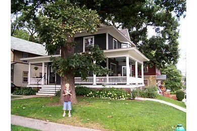 Exterior Front. Large covered wrap-around Deck.