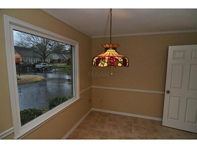 Breakfast area with new tile floor.