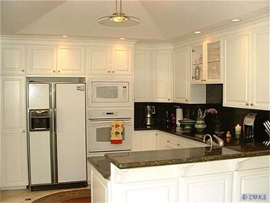Remodeled kitchen with granite counter tops, newer