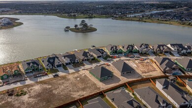 Just one row of homes sits between this home and t