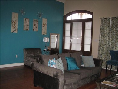 View of great room with accent wall