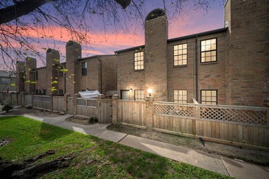 Discover the inviting charm of this two-story bric