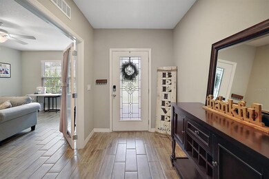Foyer and den/study