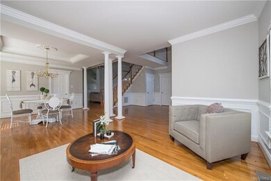 Inviting Living Room opens to the Dining Room with