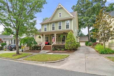 Large front porch looks directly into Forest Park.