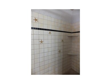 Bathroom. Nice tiled shower!