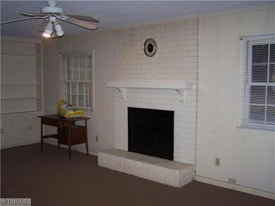 Den/Family/Great Room. Huge den with fireplace and built-in cabinetry in Basement