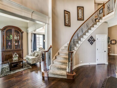 Spiral Staircase and Elaborate Wood Trim