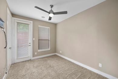 Downstairs bedroom with access outside.