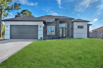 3409 24th St SW, Lehigh Acres, FL 33976 - photo 2