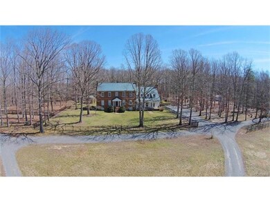 AERIAL VIEW OF HOME W/CIRCULAR DRIVE & WROUGHT IRO