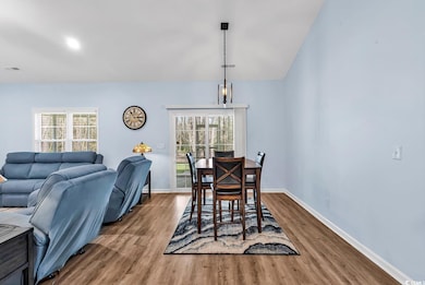 Dining room featuring a wealth of natural light, v