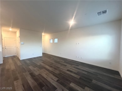 Living room with recessed lighting and luxury vinyl plank floors