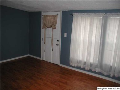 This room is off of kitchen and could be a living 