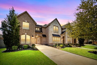 Beautifully landscaped front of property with the twilight ambience in the sought after Southern Trails community.