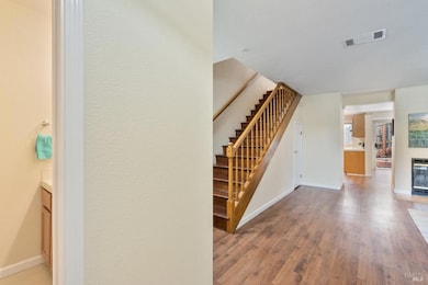 Half bath to left of white slate entry