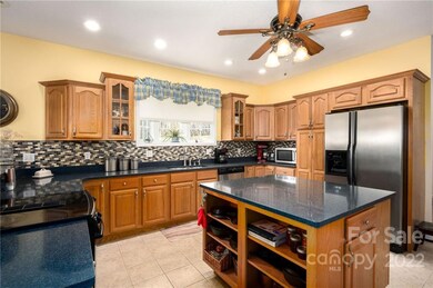 Quartz countertops and gleaming stainless appliances
