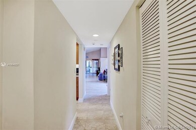 Hallway when you enter with lots of Natural Light.