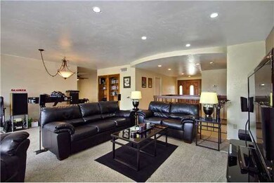 Upstairs family room- the book shelf opens up to a