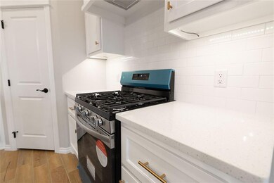 Kitchen featuring light hardwood / wood-style floo